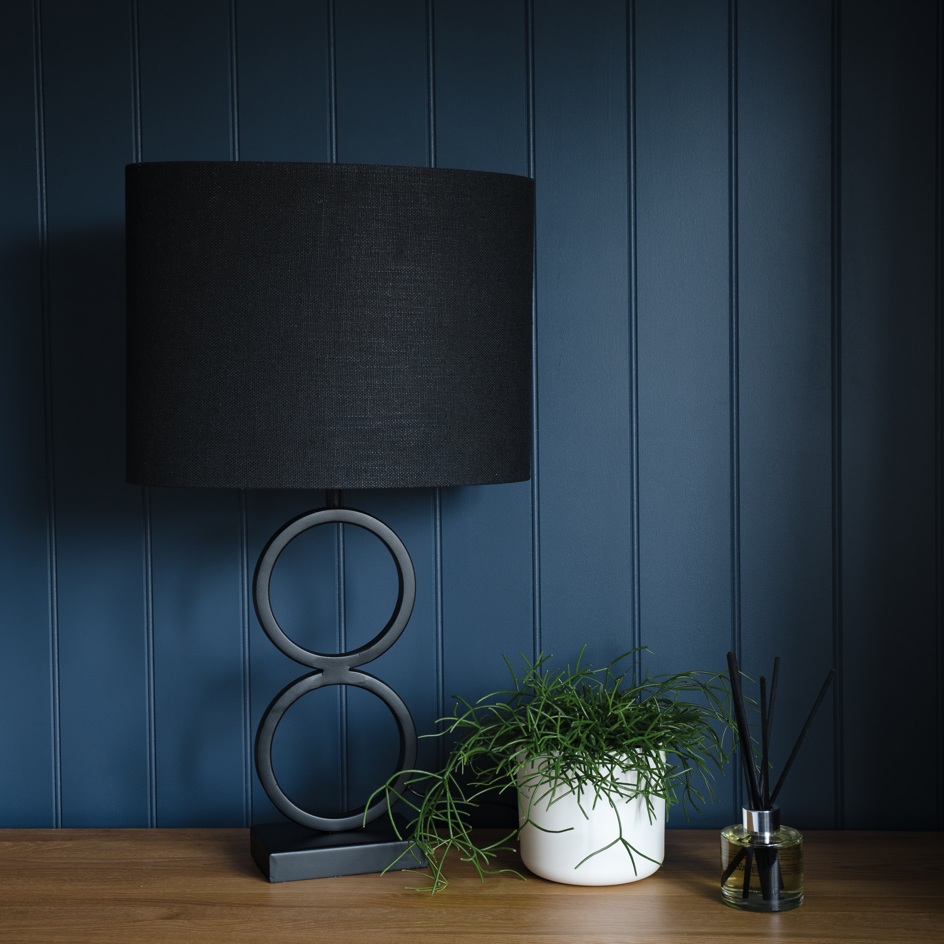 Stelios Curved Black Metal Table Lamp with a Black Linen Shade