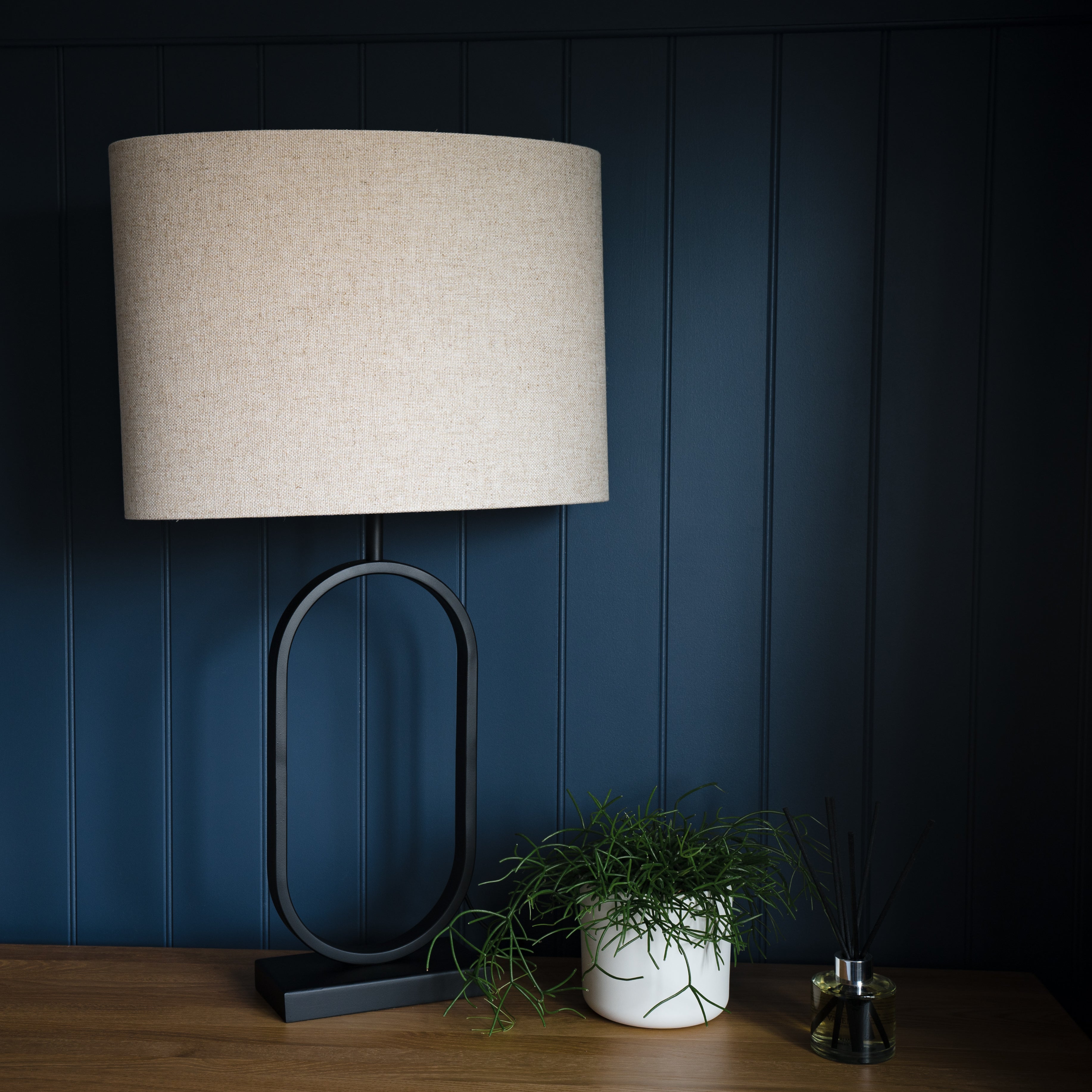 Jamiri Black Metal Oval Table Lamp with Natural Linen Shade